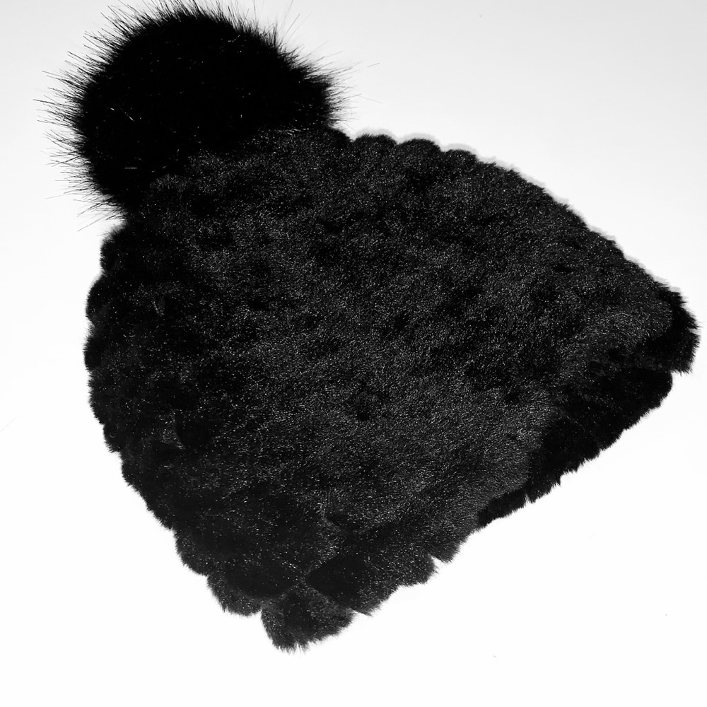 Calvin Klein black fur hat.